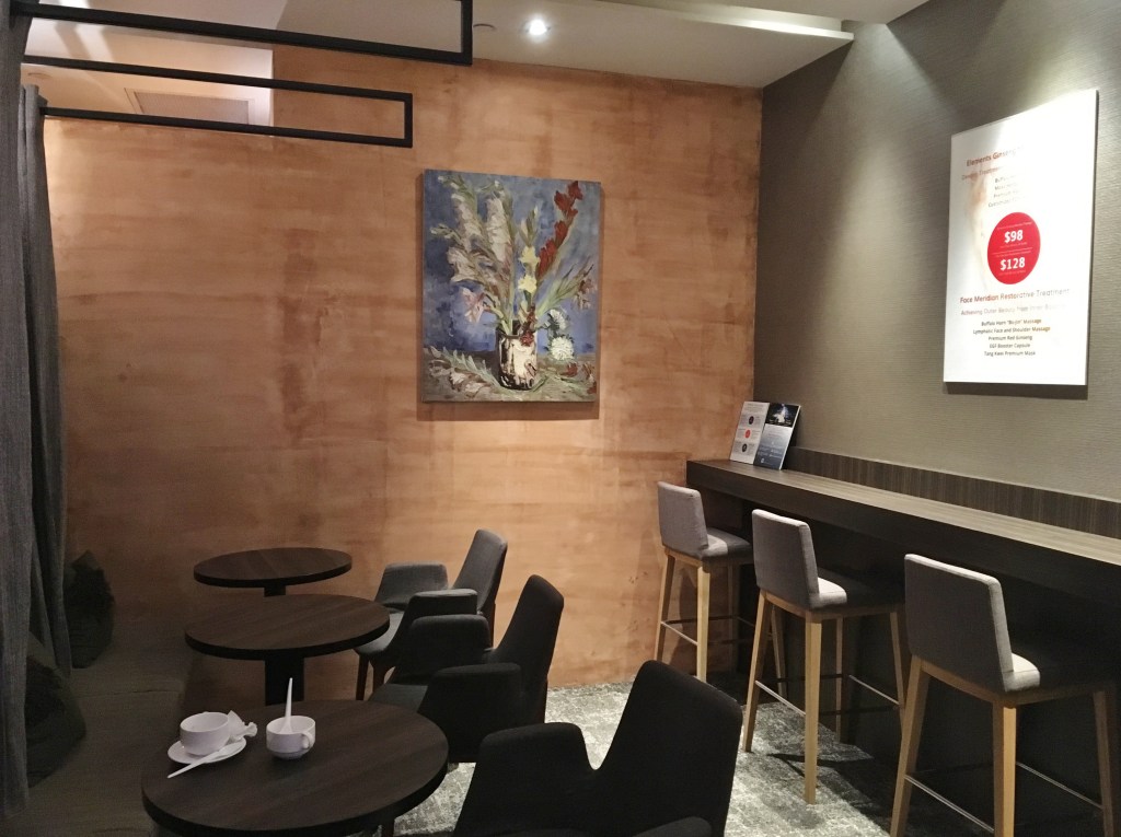 Dining area with neatly lined tables and chairs at Spa Infinity