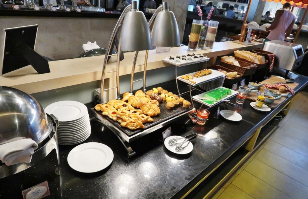 Buffet breakfast spread of breads and pastries at Swiss-Belinn Legian Hotel