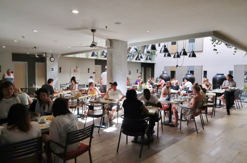 Guests seated at the dining area at Swiss-Belinn Legian Hotel