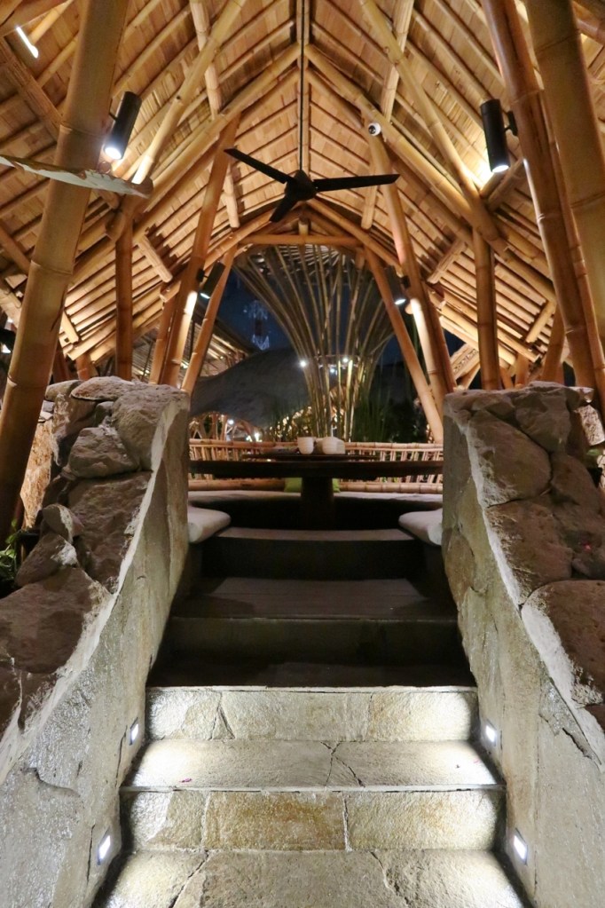 Stone stairs entrance up to sheltered hut dining area at Wanaku IndoAsian Cuisine Restaurant