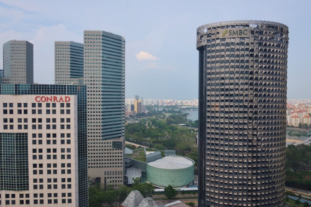 Our room view of Conrad Centennial Hotel, SMBC building and other buildings in the distance