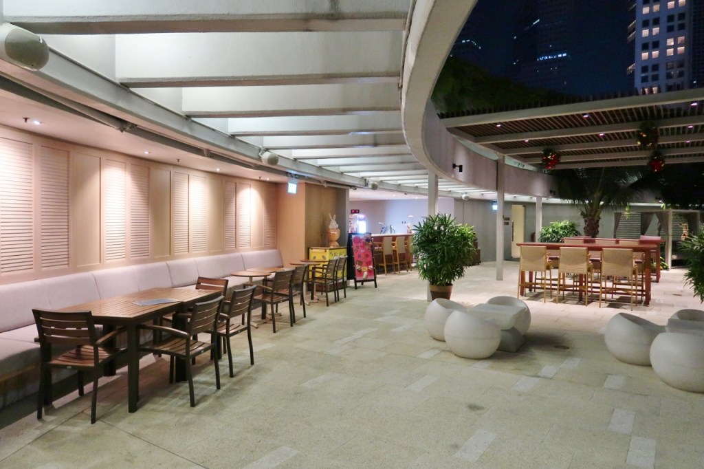 Seating area at Pan Pacific Hotel's Poolside Bar restaurant