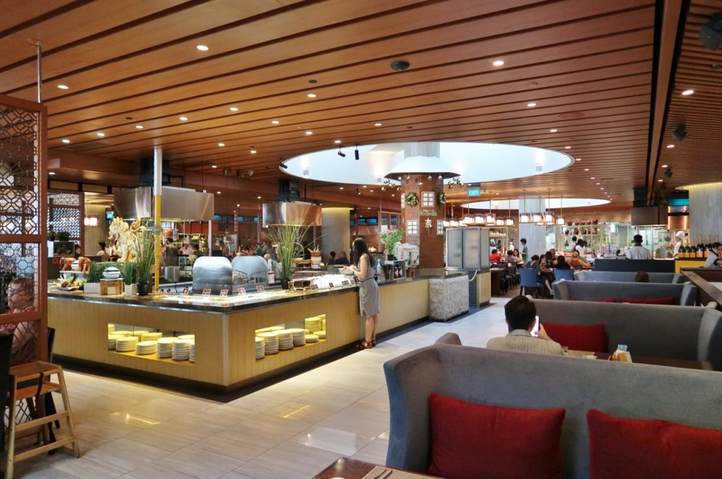 Seating area and buffet breakfast at Pan Pacific Hotel's Edge restaurant