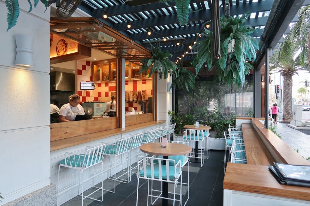 Outdoor seating area at Betty's Burgers & Concrete Co. Restaurant