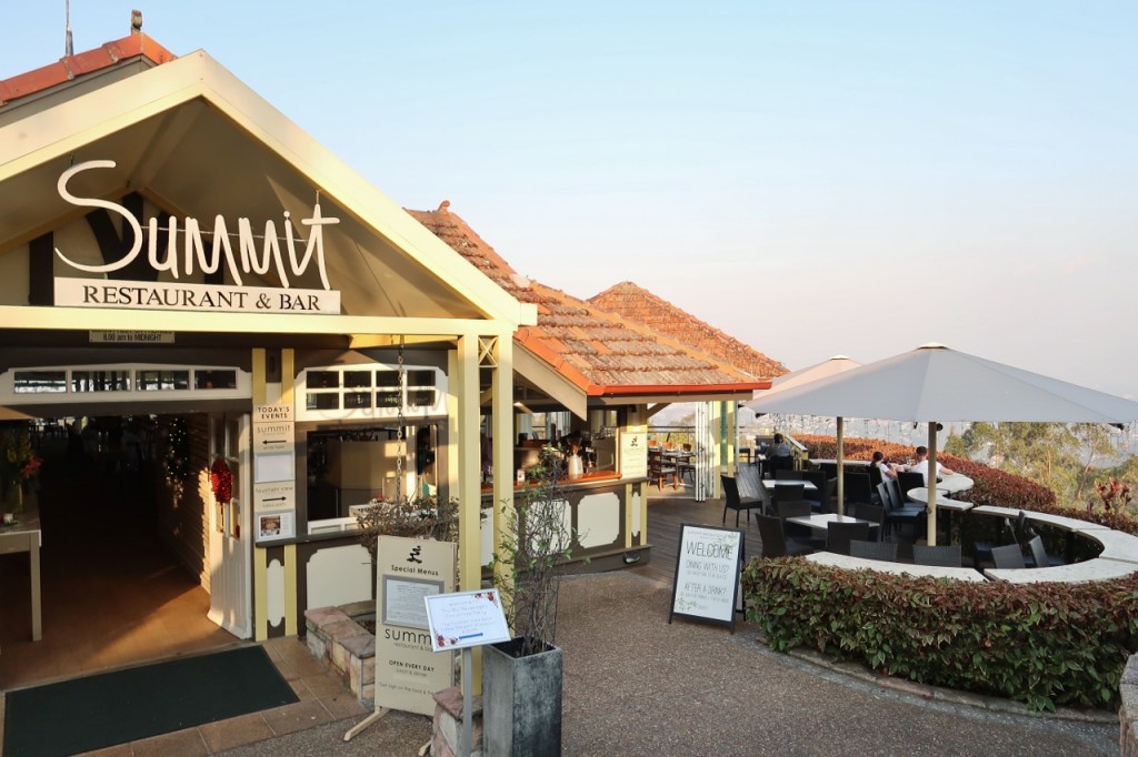 Entrance and outdoor seating area at Summit Restaurant & Bar
