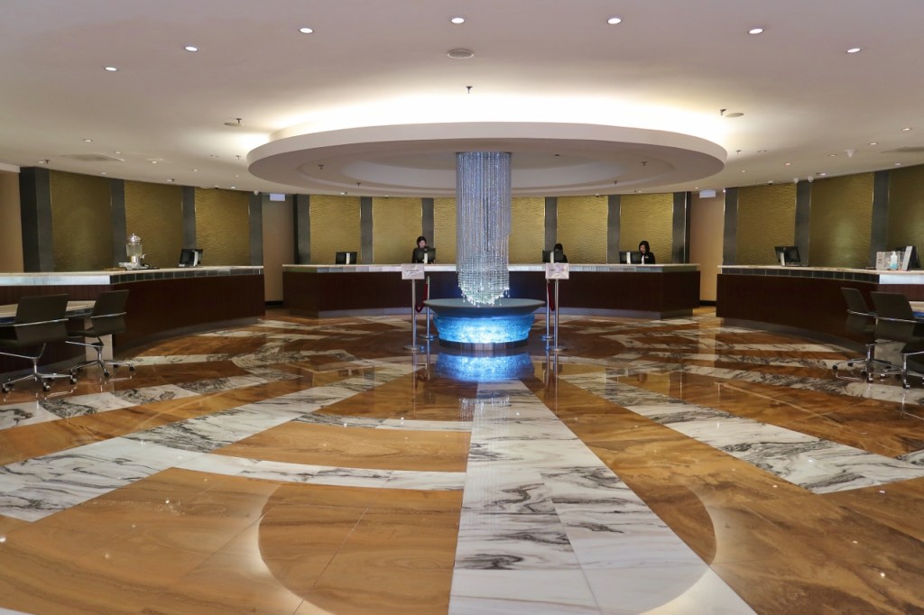 Reception counter area at PARKROYAL Collection Marina Bay Hotel