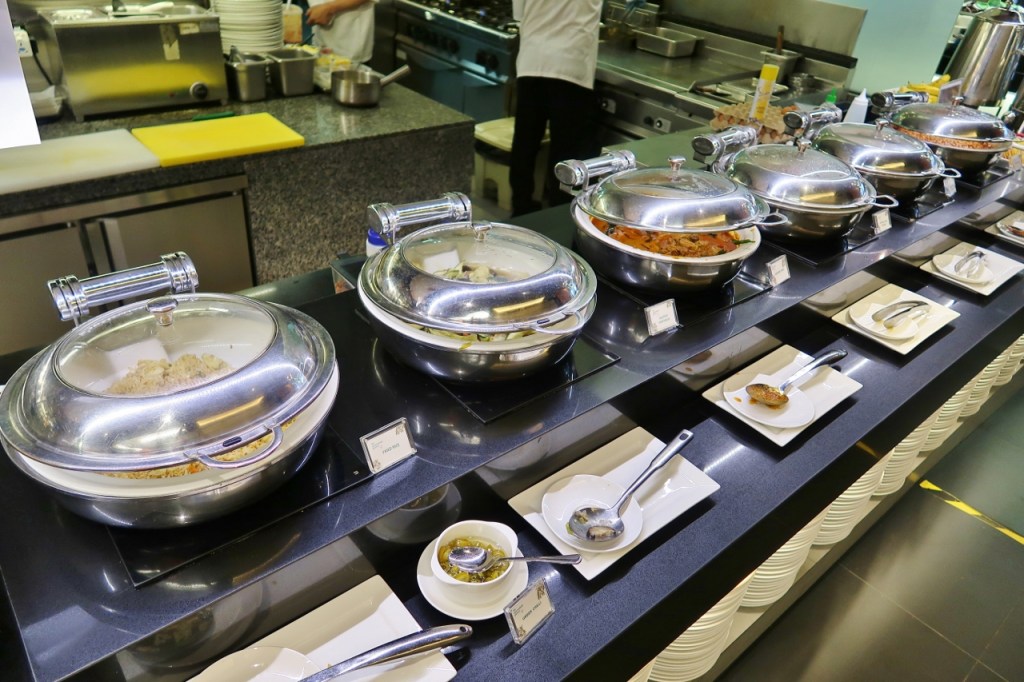 The Marmalade Pantry's breakfast buffet spread of hot food at Oasia Hotel Novena
