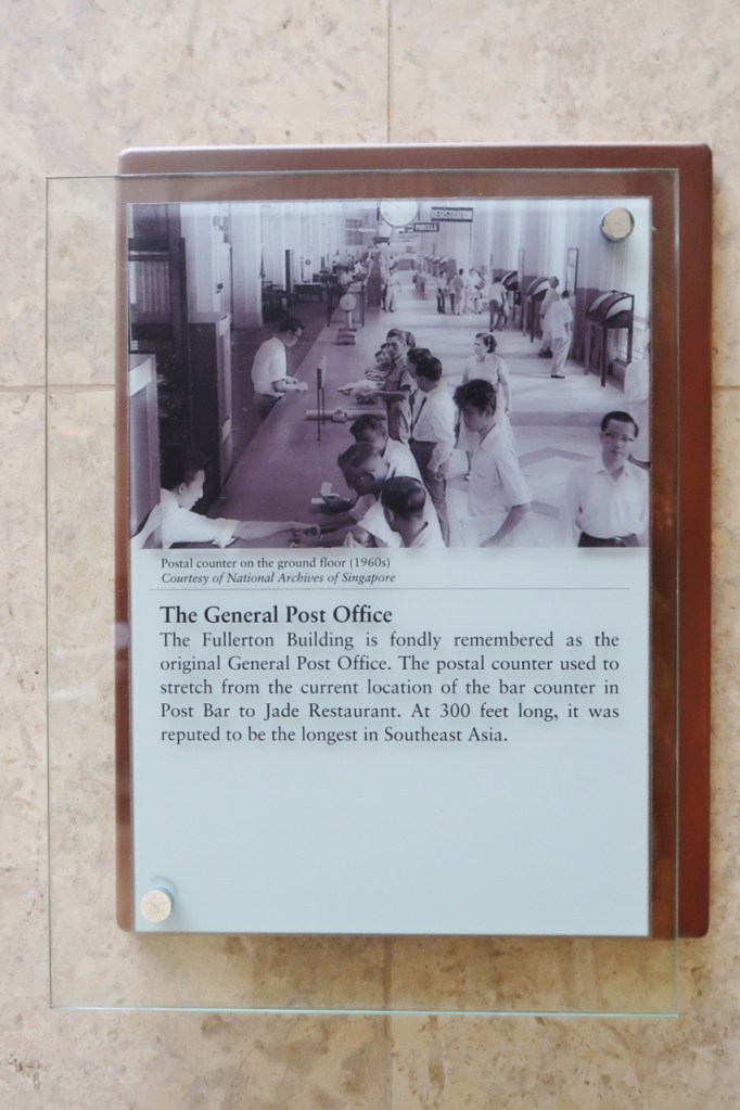 A trivia plaque mounted on the wall at The Fullerton Hotel