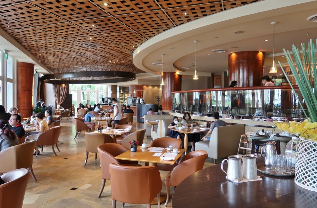 Indoor seating area at Town Restaurant at The Fullerton Hotel