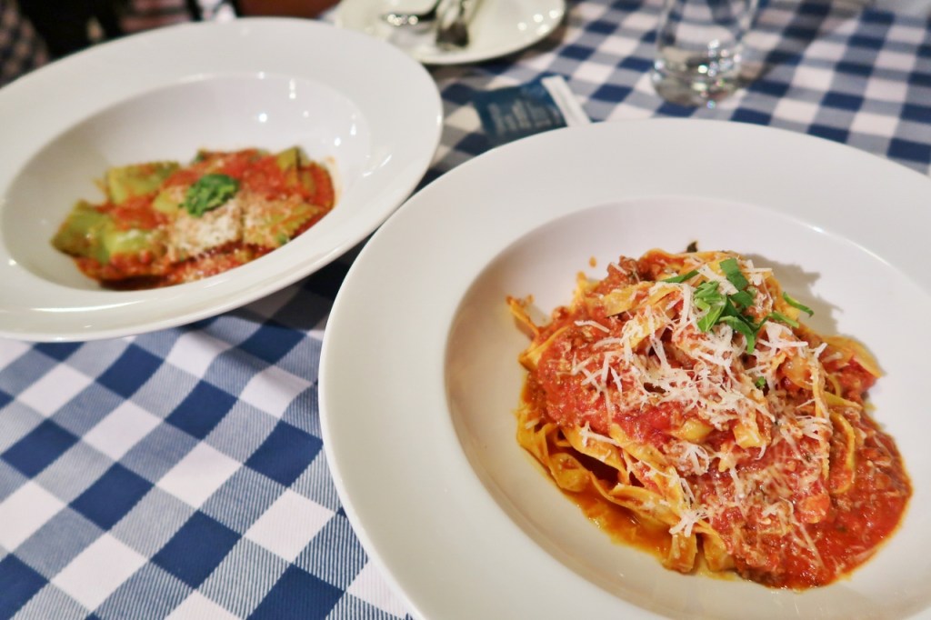 Spinach and ricotta ravioli and tagliatelle bolognese from Pete's Place restaurant at Grand Hyatt hotel
