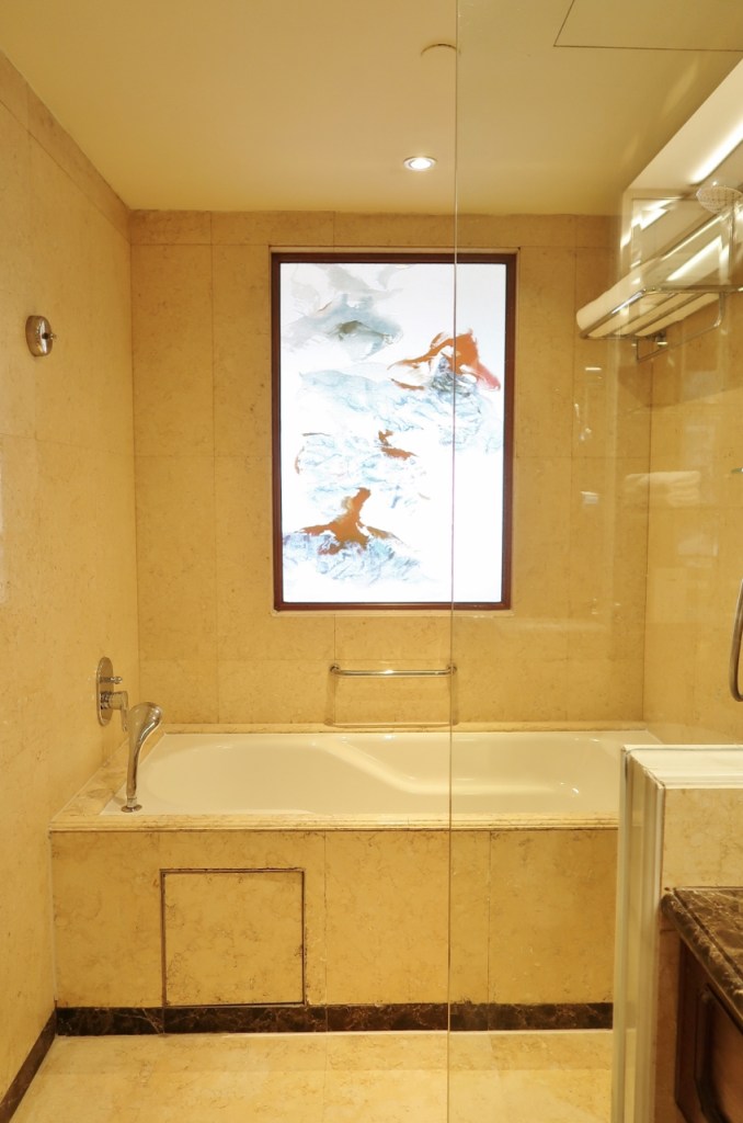 Full-sized bathtub in Regency Suite at Mandarin Orchard Hotel