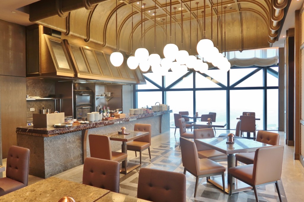 665°F steakhouse restaurant's dining area at Andaz Hotel