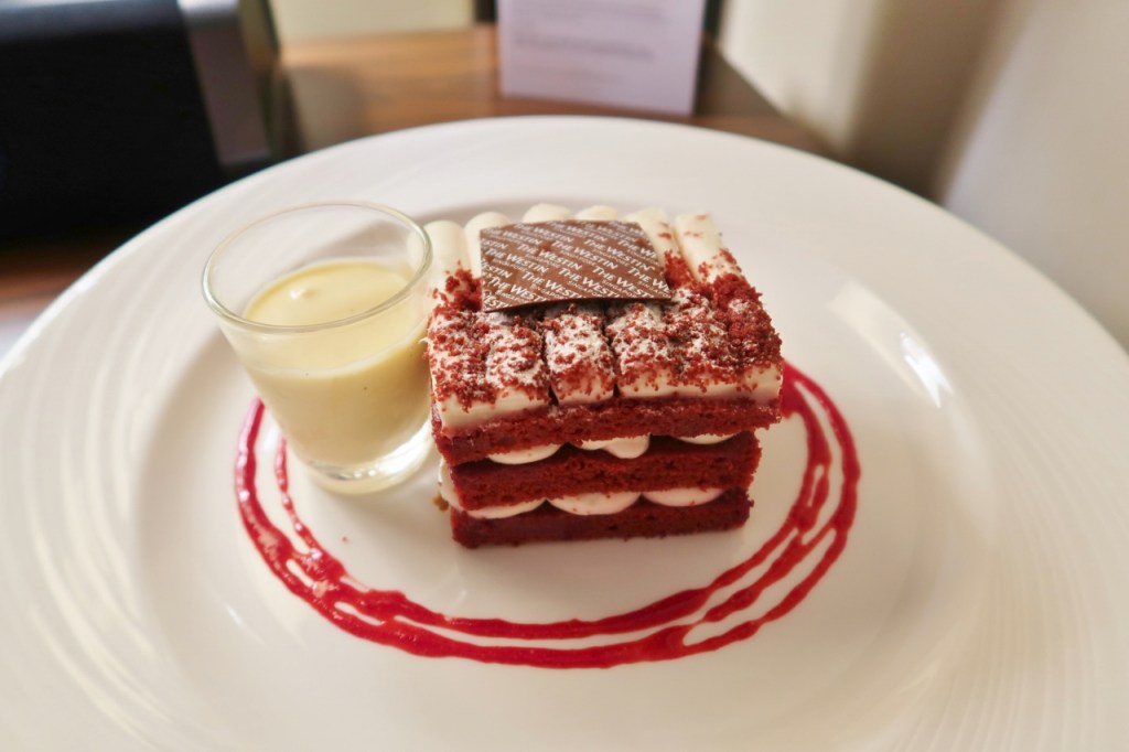 Red velvet cake with vanilla sauce from in-room dining at The Westin Hotel