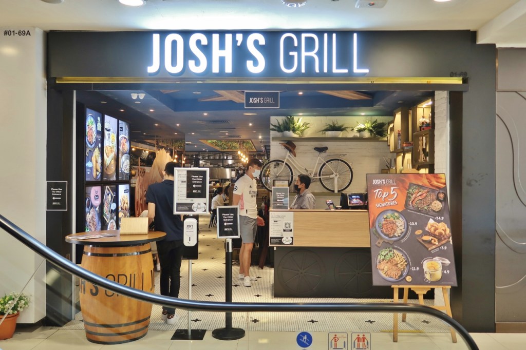 Cashier counter and exit from Josh's Grill restaurant