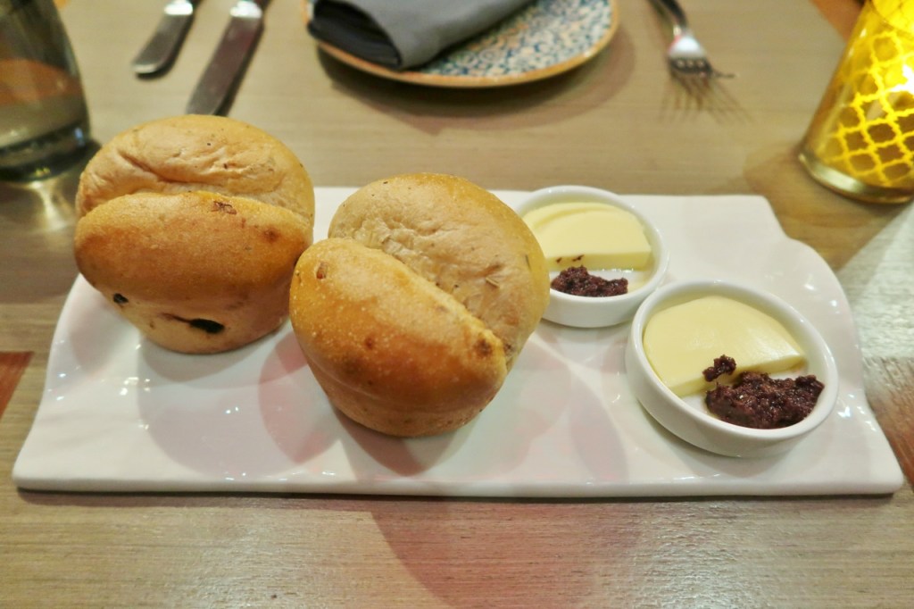 Bread, butter and tapenade starter dish from Ash & Elm at InterContinental Hotel