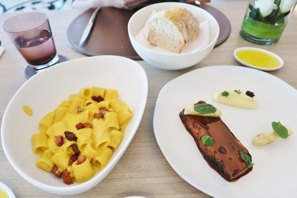 Bread and olive oil, rigatoni carbonara and brasato wagyu beef dishes from Dolce Vita at Mandarin Oriental Hotel