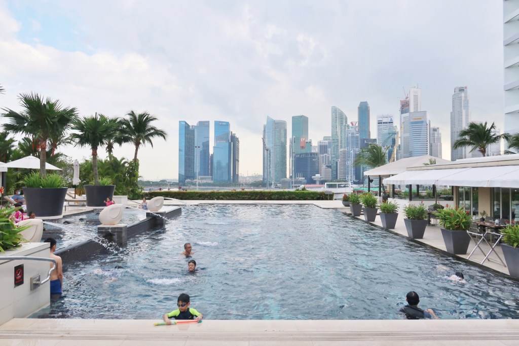 Swimming pool at Mandarin Oriental Hotel with a view of the CBD area