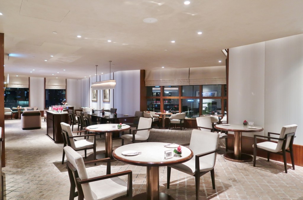 Seating area in Conrad Centennial Hotel's club lounge