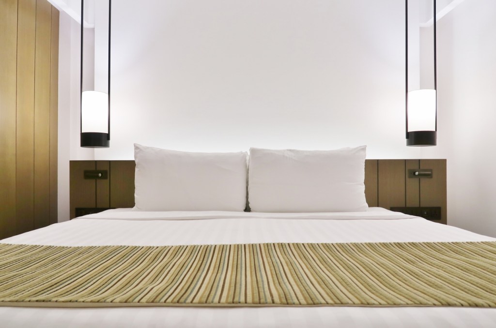 King-size bed in Junior Suite at Goodwood Park Hotel