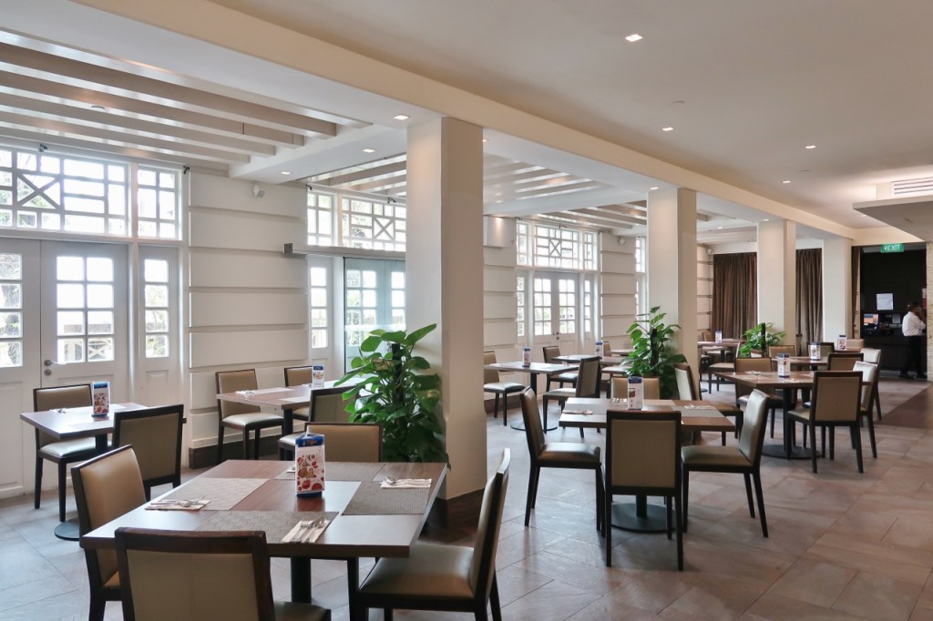 Seating area at The Salon restaurant at Hotel Fort Canning