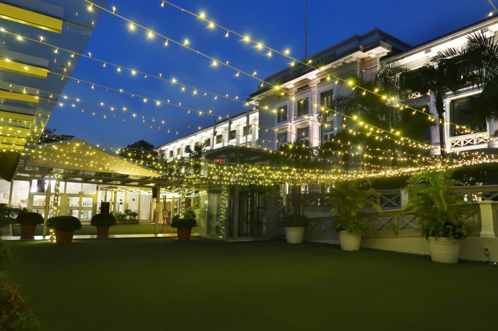 The Garden Terrace with the fairy lights switched on in the evening at Hotel Fort Canning