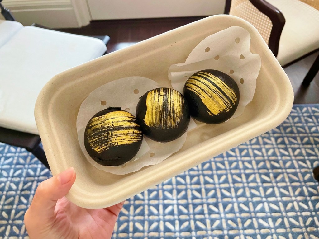 House specialty black gold egg custard buns from Yi by Jereme Leung restaurant at Raffles Hotel