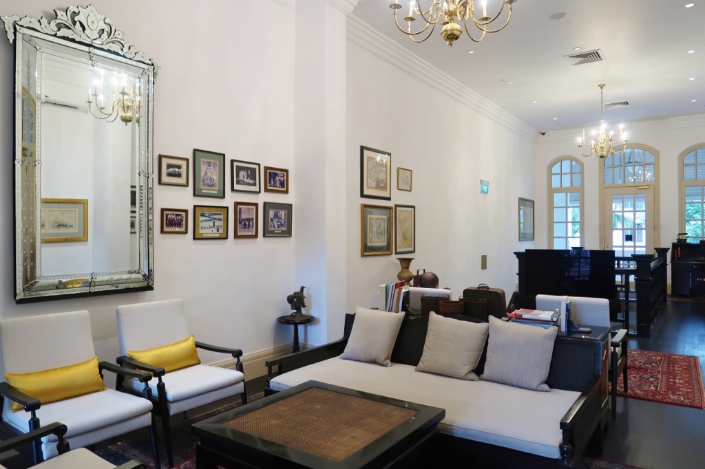 Seating area in the library at Raffles Hotel