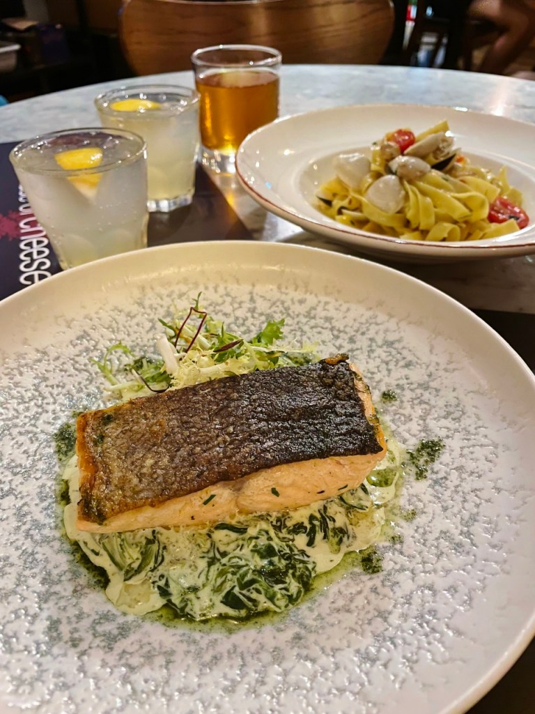 Scottish salmon, vongole tagliatelle, signature mocktails and apple juice from Ginett restaurant at Hotel G