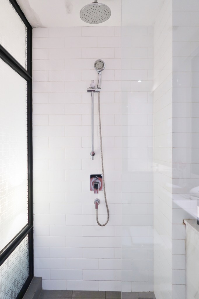 Shower area in Deluxe King Room at Hotel NuVe Heritage