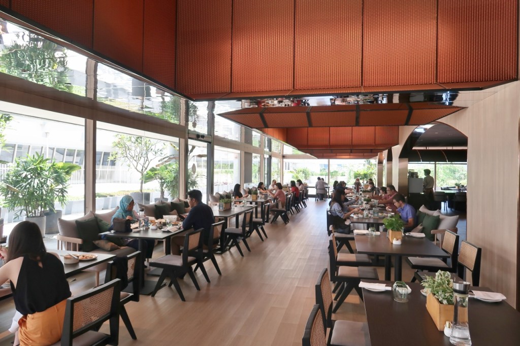 Inner seating area at Peppermint Restaurant at PARKROYAL COLLECTION Marina Bay Hotel