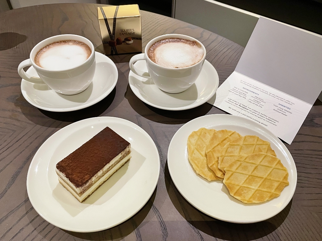 Food, beverages and chocolate from turndown service at Oakwood Premier AMTD Hotel & Serviced Apartments