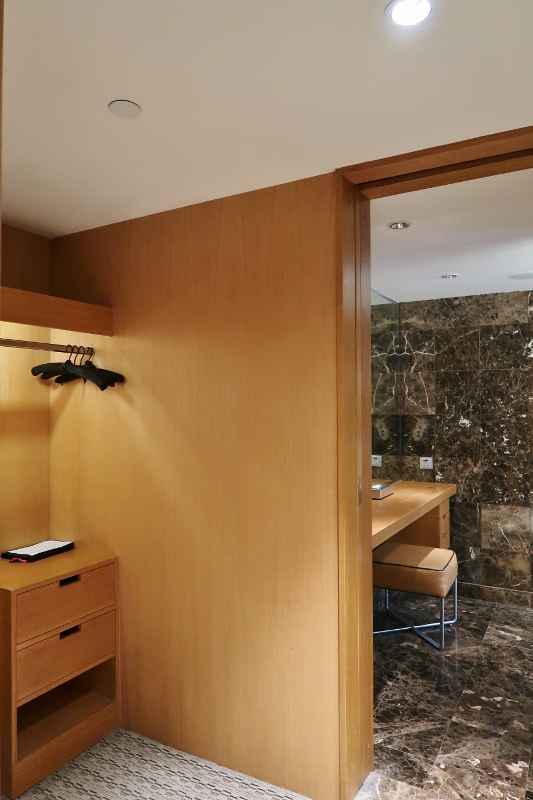 Walk-in wardrobe in Twin Bed Deluxe Room at Grand Hyatt Hotel