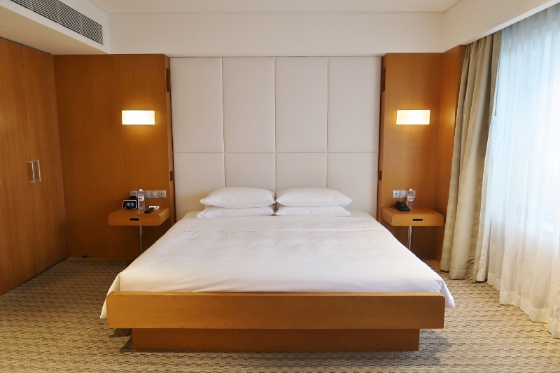 Bedroom in King Bed Deluxe Room at Grand Hyatt Hotel