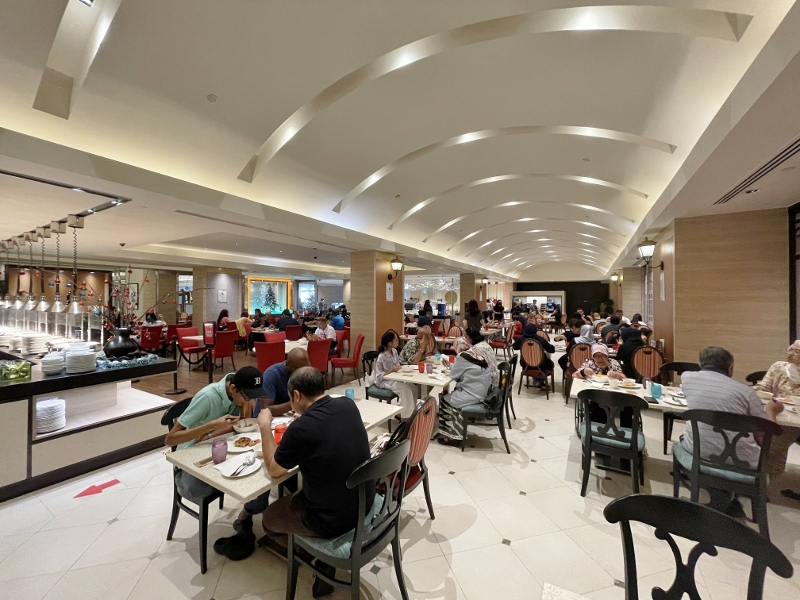 Seating area at Carousel buffet restaurant at Royal Plaza On Scotts Hotel