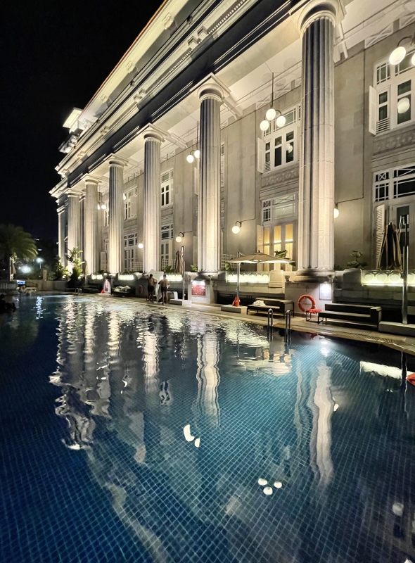 Swimming pool at night at The Fullerton Hotel