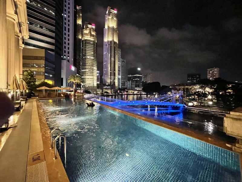 Swimming pool at night at The Fullerton Hotel