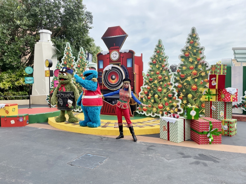 Sesame street characters dressed in Christmas-themed clothing at Universal Studios Singapore