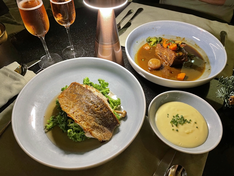 Slow-cooked beef short ribs and roasted sea bass in yuzu soy broth from One-Ninety Bar at Four Seasons Hotel