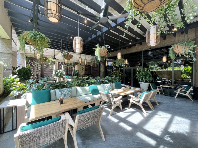 Outdoor seating area at Garden@One-Ninety at Four Seasons Hotel