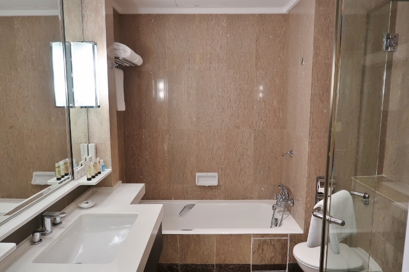 Bathroom in Premier Club Room (level 15) at Orchard Hotel