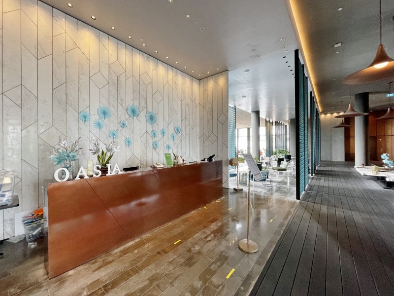 Oasia Hotel Downtown club reception counter on level 21