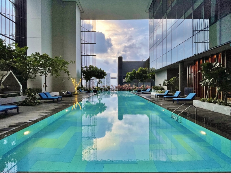 Club swimming pool on level 21 at Oasia Hotel Downtown