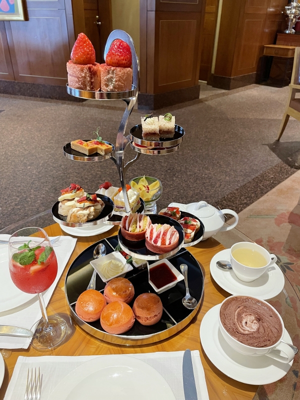 Simply Strawberries afternoon tea food and drinks at the Lobby Lounge restaurant at Conrad Centennial Hotel