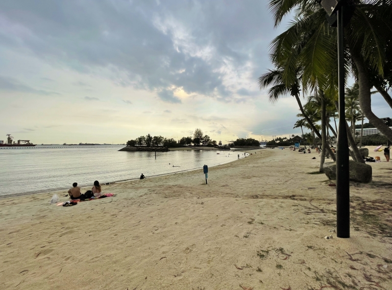 Sunset by Siloso beach at Summerhouse Beach Club restaurant at AJ Hackett