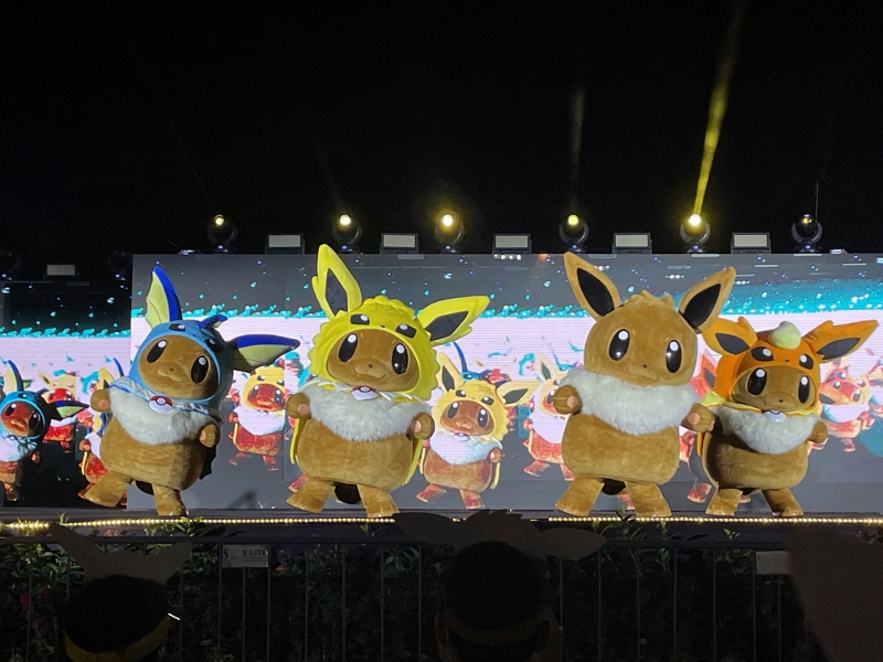 Dancing Eevee characters on stage during the Eevee Dance Parade with Evolution Poncho performance at Palawan Beach Sentosa