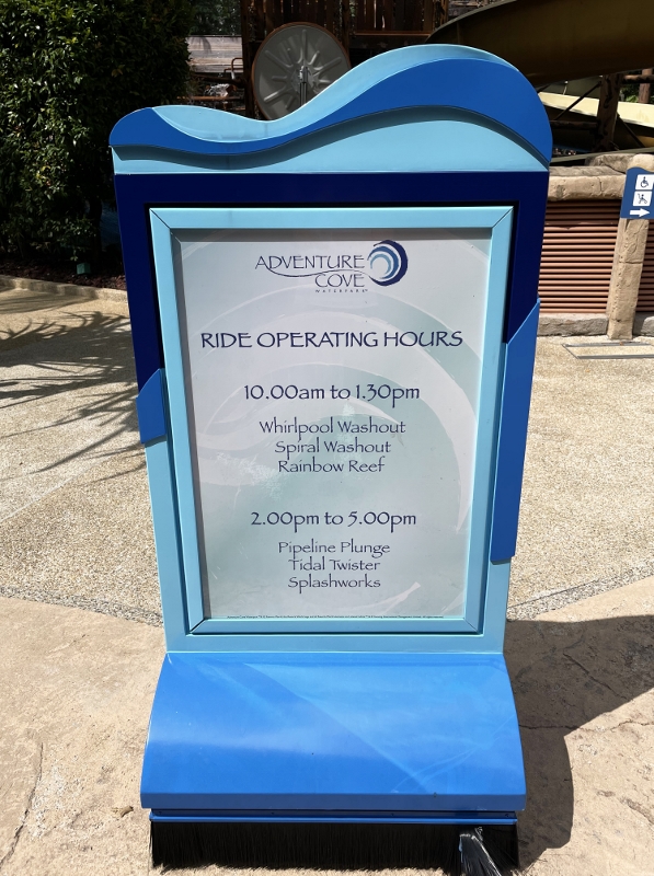 Ride operating hours board at Adventure Cove Waterpark theme park