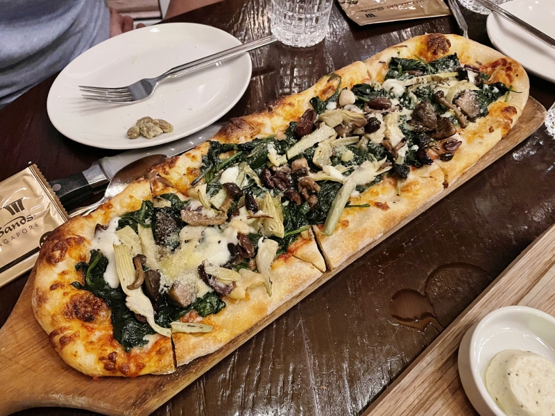 Spinach and artichoke pizza from LAVO Italian Restaurant & Rooftop Bar