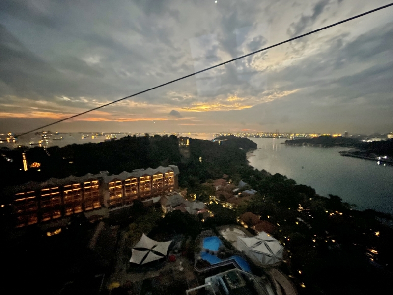 The view of the fading sunset from a cable car