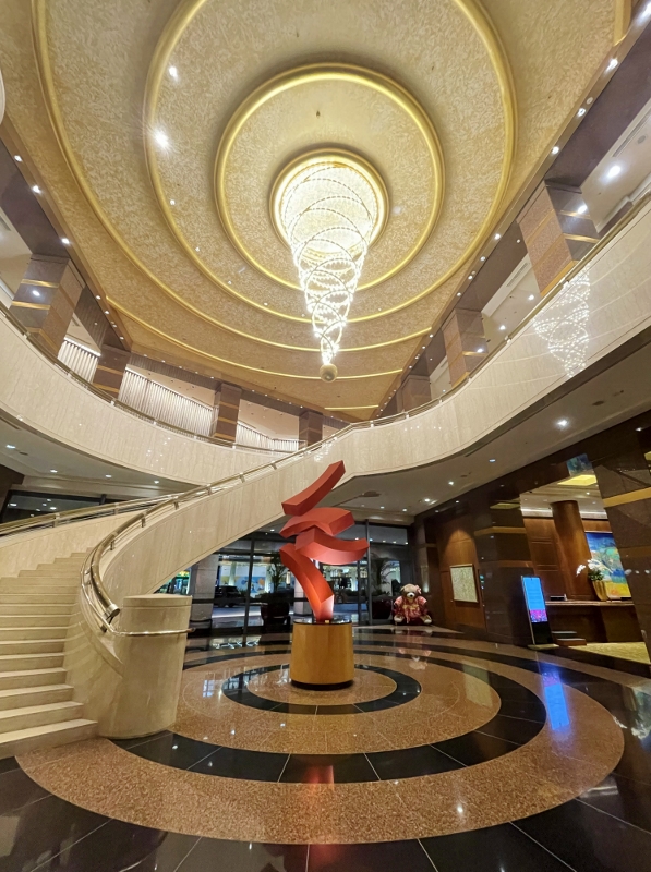 Lobby reception area at Conrad Centennial Hotel