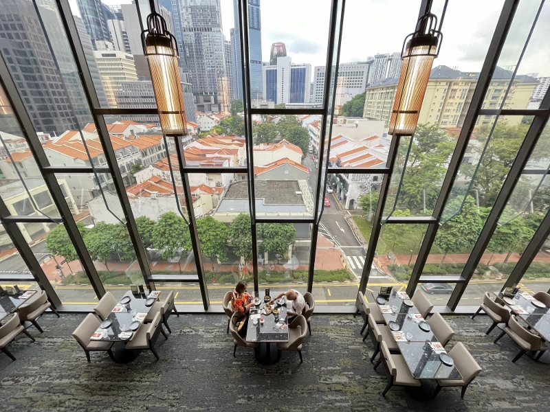 Seating area at QIN restaurant and bar at The Clan Hotel